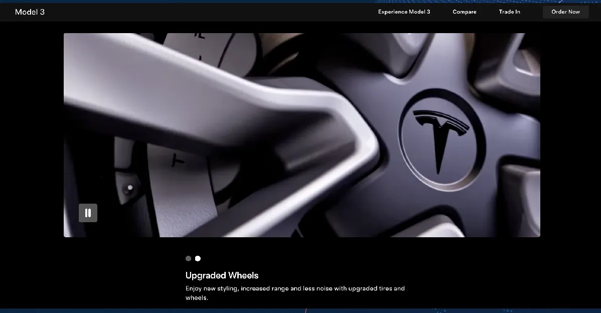 When To Use CSS Video Background In Landing Pages (And When To Skip Them) 5 Tesla's CSS video background depicting the features of the Model 3 with a tire displaying Tesla logo