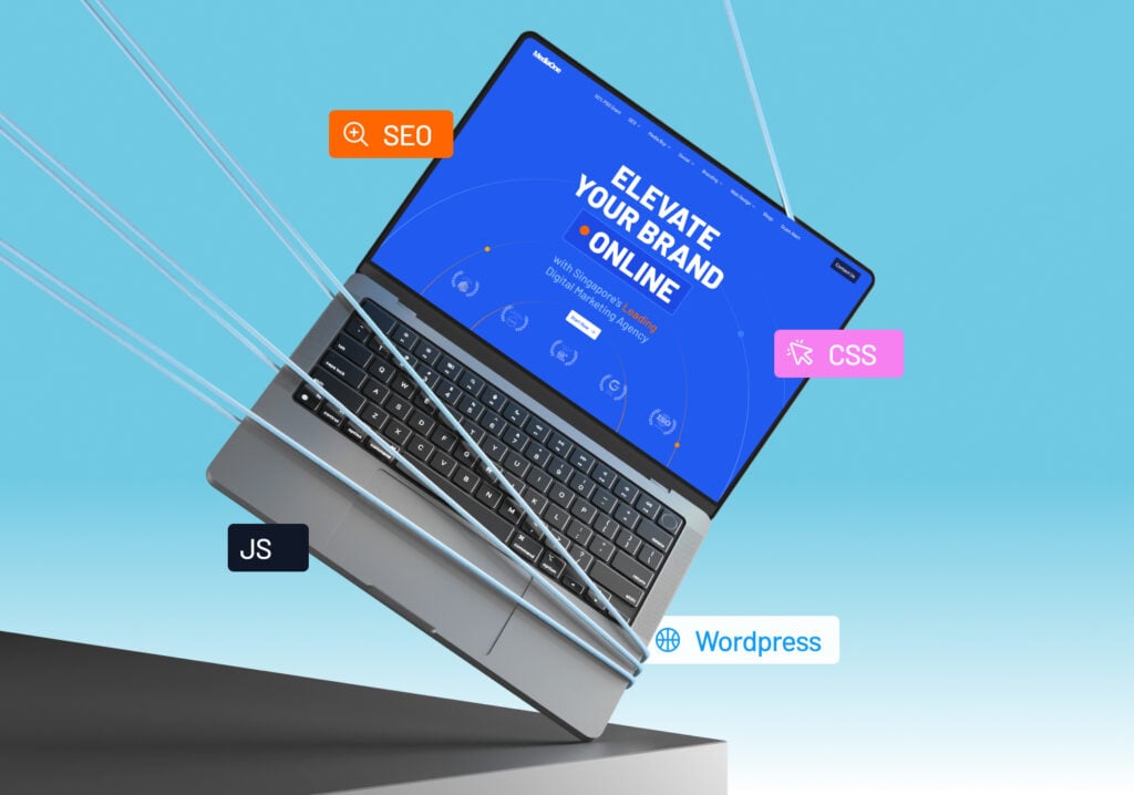Laptop displaying digital marketing services, including SEO, web development (JS, CSS), and WordPress solutions.