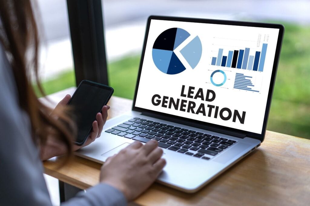 Professional using laptop to showcase lead generation concept.