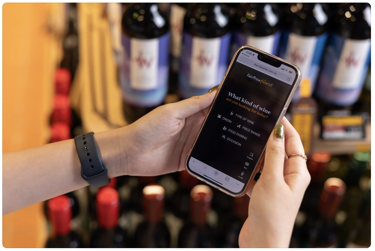 AI Search Has Changed How People Search & Buy: How to Keep Up With It 3 Shopper using AI search on a mobile phone inside a Singapore store.